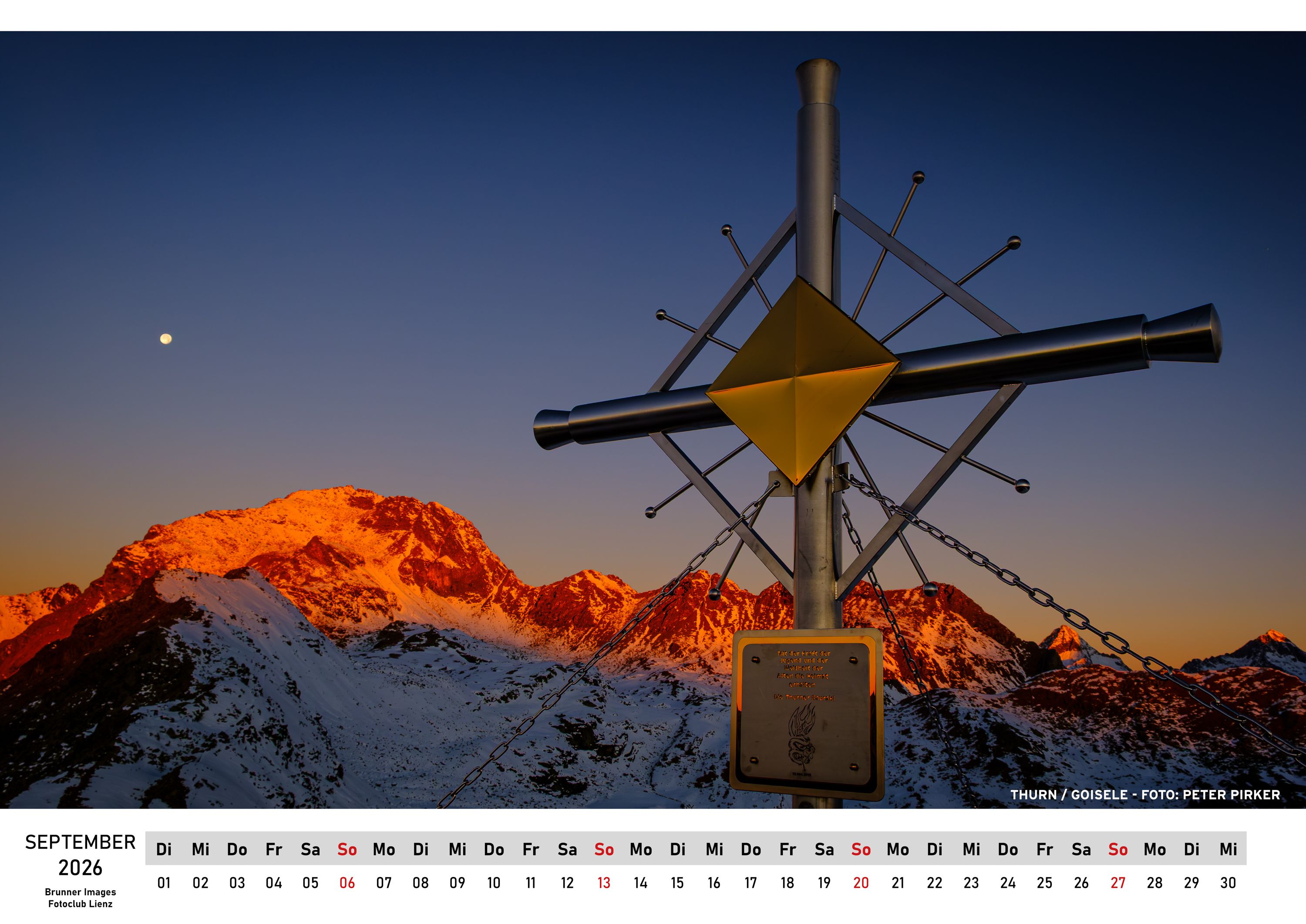 Bild aus dem Fotokalender, Gipfelkreuz in silber vom Goisele, bei Sonnenuntergang
